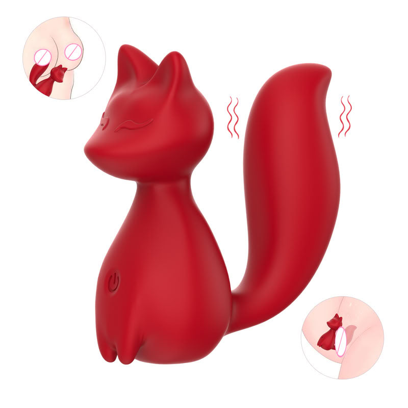 Red silicone fox-shaped vibrator with a sleek curved vibrating tail and static body handle. 
