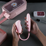 Switch detachable 2-in-1 app-controlled g-spot vibrator showing sonic sucking nozzle and pulse-thrusting shaft connected by a soft silicone cord