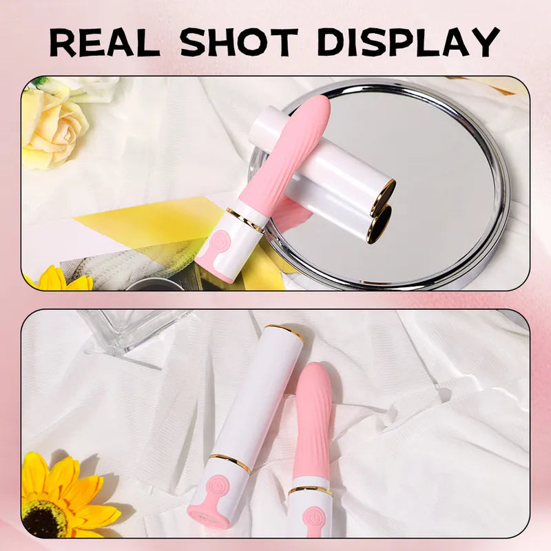 Real shot display of the white Breeze Lipstick Vibrator resting on silk fabric next to a vanity mirror.