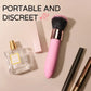 Fizzglow Caress G-Spot Vibrator displayed naturally beside perfume and cosmetic essentials for discreet vanity storage