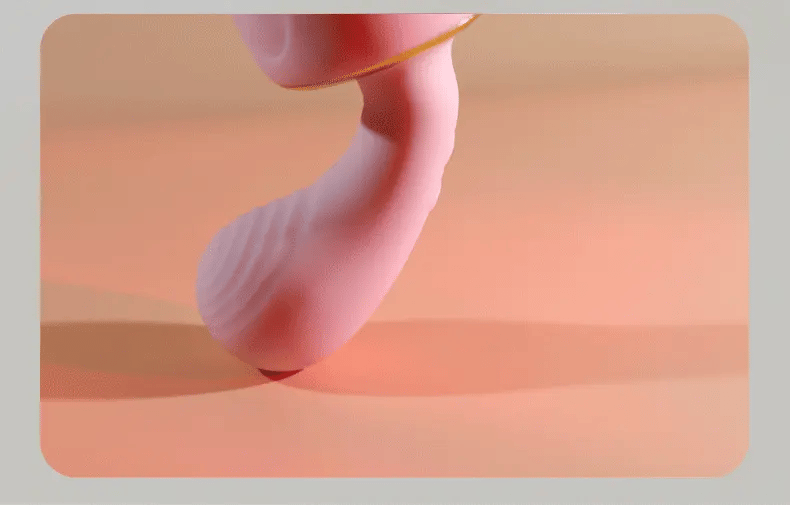 Cozy dual stimulation g-spot vibrator with ribbed insertion shaft and warming clitoral suction head