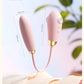Fizzglow Dew flexible U-shaped G-spot vibrator with dual stimulation suction port and tongue licking profile in pastel pink