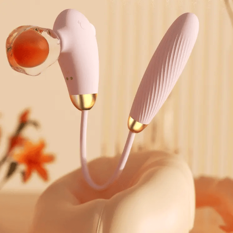 Fizzglow Dew flexible U-shaped G-spot vibrator with dual stimulation suction port and tongue licking profile in pastel pink