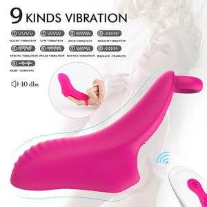 Hand holding the compact wireless remote control next to the 9-mode Glide G-Spot Finger Vibrator.
