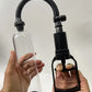 Hands-on demonstration of the Fizzglow Grip Male Vacuum Trainer showing high-clarity cylinder visibility and single-handed manual trigger pump operation