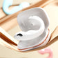 Fizzglow Pearl Wearable G-Spot Vibrator resting inside custom white dustproof travel storage case with rose gold trim