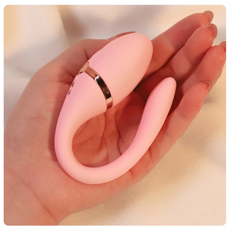 Fizzglow Sway pink wearable G-spot vibrator with wireless remote control showing its ergonomic contours.